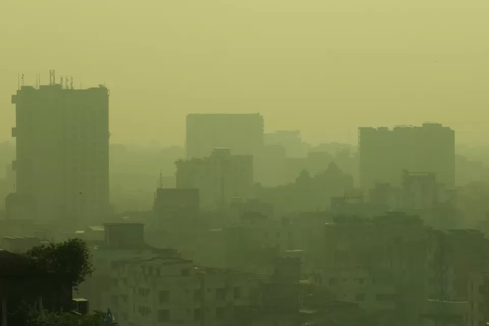 Air pollution is visible in the air around high-rise buildings in Dhaka, Bangladesh.